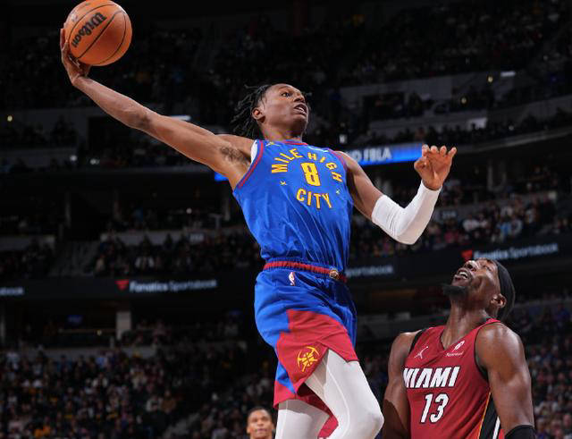 热火队客场逆转掘金队，取得惊险胜利